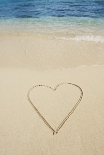 Heart drawn in sand.