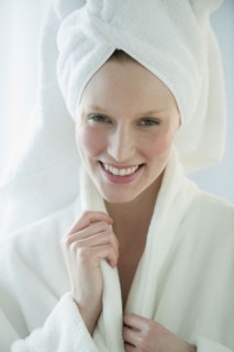Woman in robe and towel.