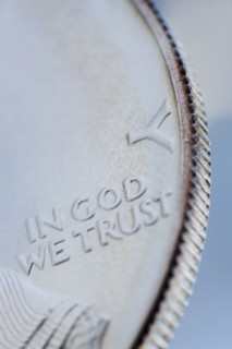 Close up of silver coin.