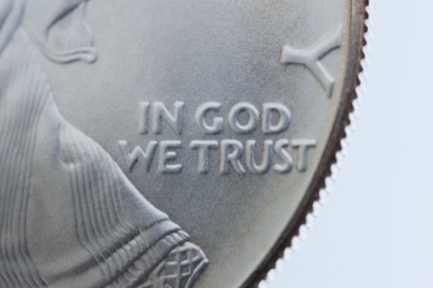 Close up of silver coin.