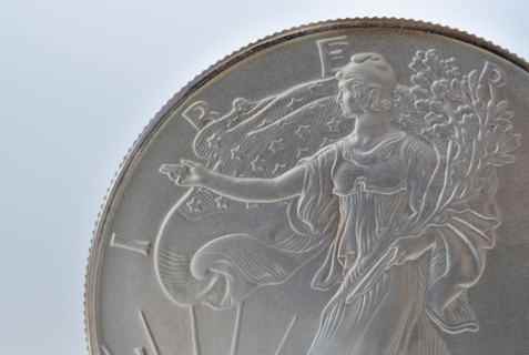 Close up of silver coin.