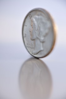 Close up of silver coin.