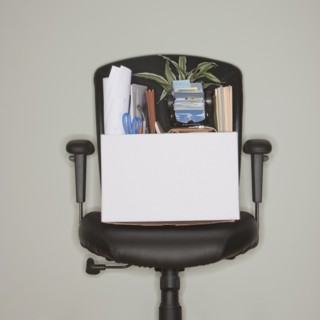Packed box on office chair.