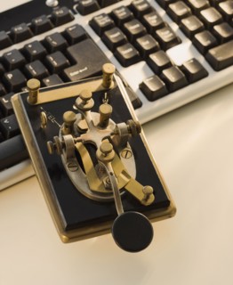 Antique telegraph key and keyboard.