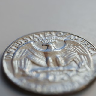 Close up of silver coin.