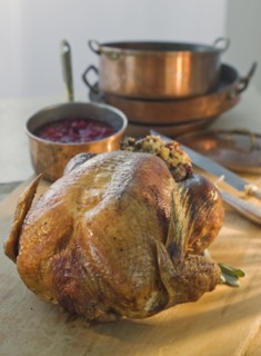 Thanksgiving turkey on cutting board.