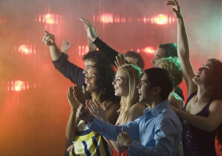 People enjoying concert.