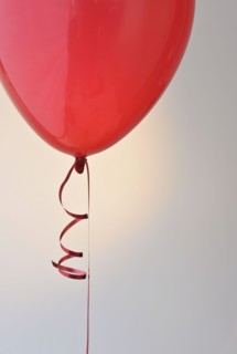 Red balloon and ribbon.