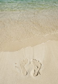 Footprints in sand.