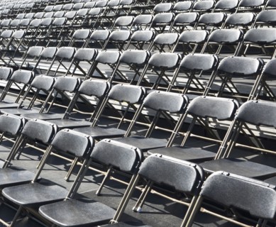 Empty stadium seats. Photographe : fotog