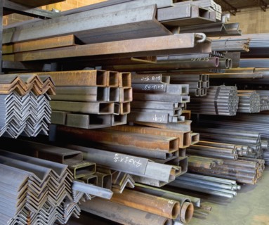 Stacks of raw steel in warehouse. Photographe : fotog