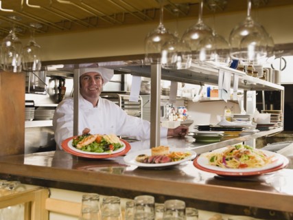Chef in restaurant kitchen.