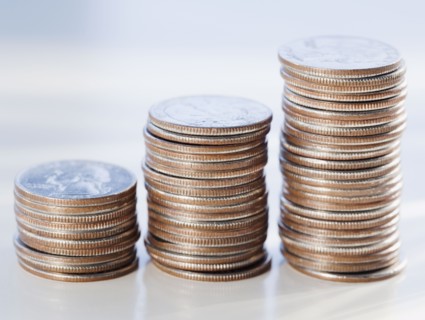 Stacks of coins. Photographe : Jamie Grill