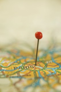 Close up of pin on map location. Photographe : Daniel Grill