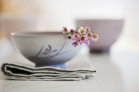 Tropical flowers in bowl.