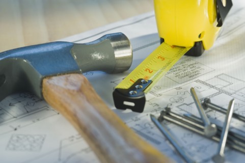 Close up of blueprint and tools. Photographe : Daniel Grill