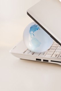 Globe inside laptop.