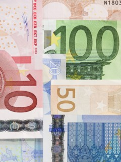 Close up paper currency. Photographe : Jamie Grill