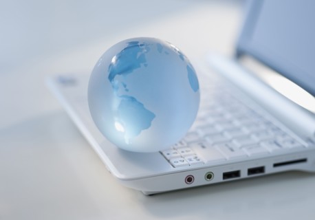 Globe on laptop keyboard.
