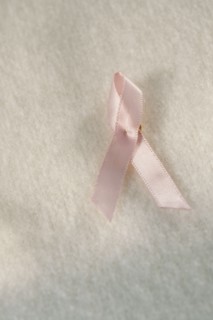 Close up of breast cancer ribbon.