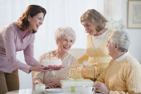 Senior woman celebrating birthday.