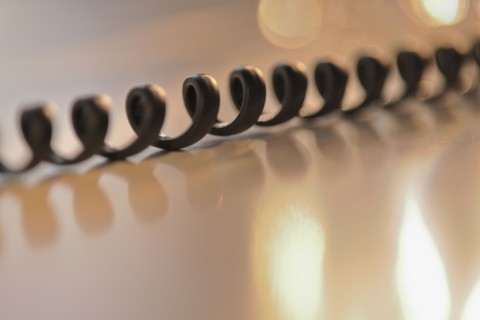 Close up of telephone cord.