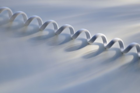 Close up of telephone cord.