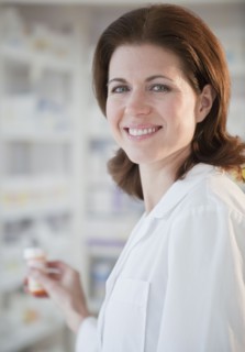 Pharmacist filling prescription.