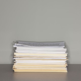 Stack of paperwork.