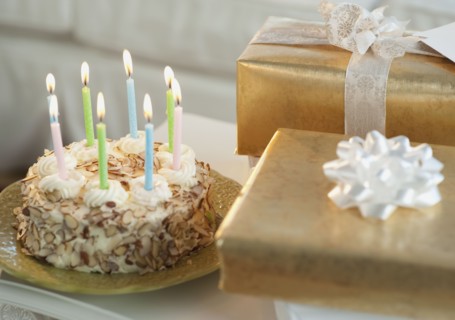Birthday cake and gifts.