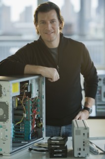Technician repairing computer.