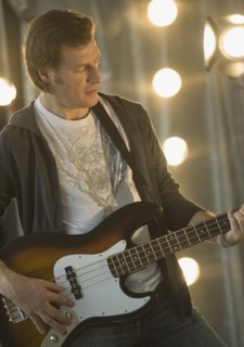 Man playing electric guitar.