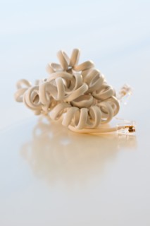 Studio shot of disconnected phone cord.