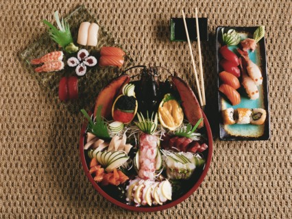 spread of sushi, sashimi &  rolls