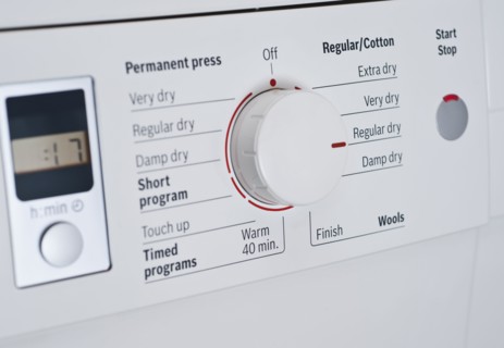Close up of Dial on Washing Machine.