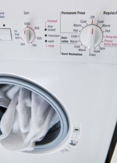 Close up of Dial on Washing Machine.