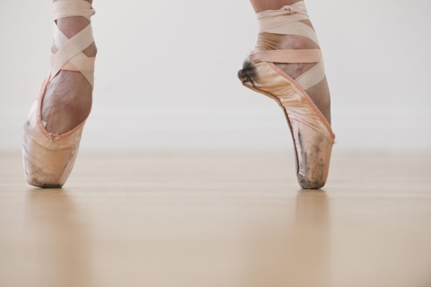 A female ballet dancer.