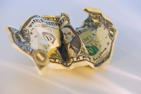 Crumpled dollar bill