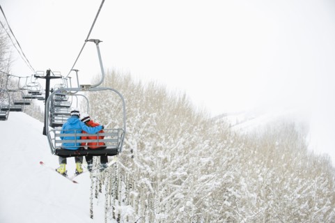 Skiers on a ski lift