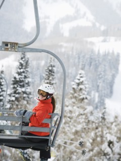 Skiers on a ski lift