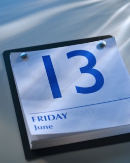 A calender showing Friday the thirteenth.