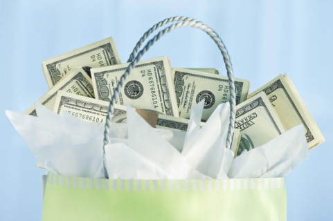 A gift bag with bank notes