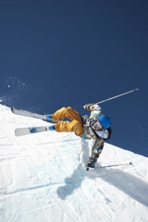 A downhill skier doing a trick