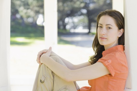 A woman at a park relaxing