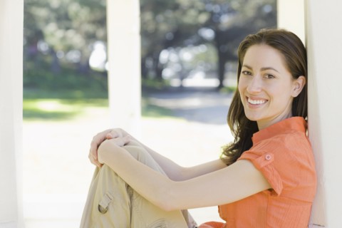 A woman at a park relaxing
