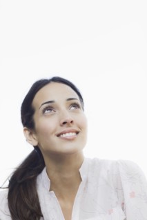 A woman outdoors smiling