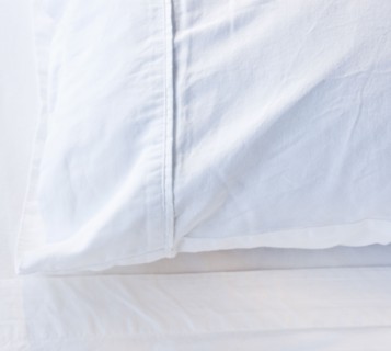 A pillow in a bed