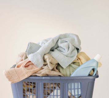 A laundry basket full of towels.
