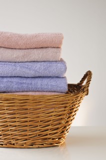 A laundry basket full of towels.