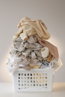 A laundry basket full of clothes.
